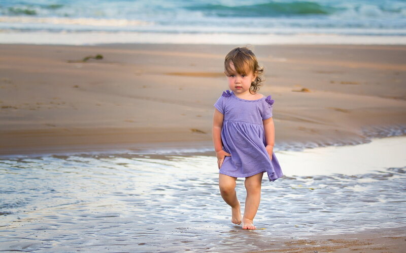 Toddler Girl on Beach — Purple