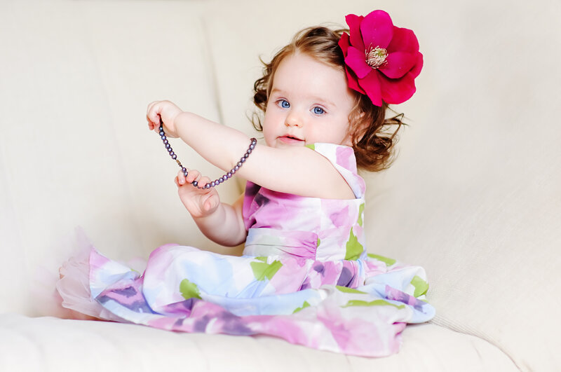 Toddler Girl with Flower