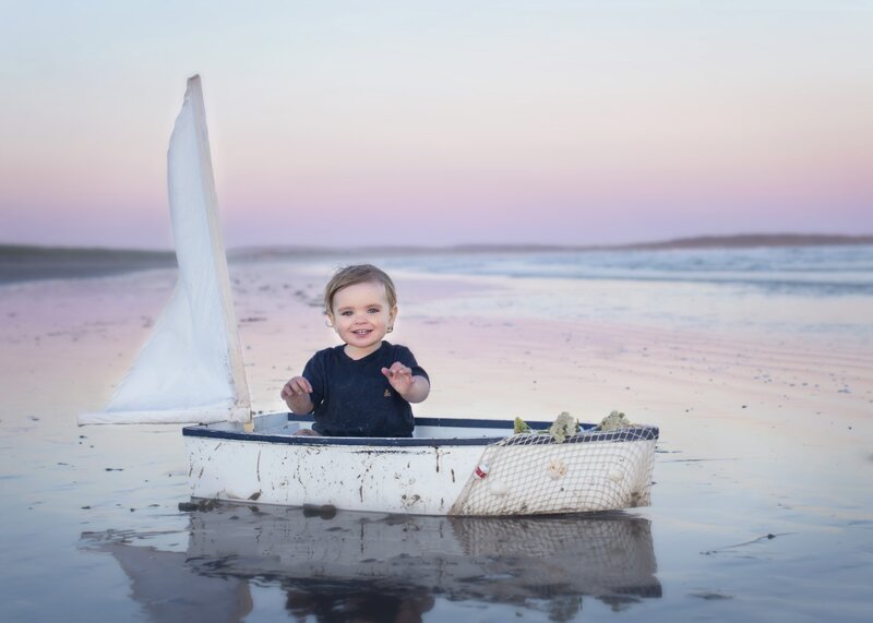 Toddler in Sailboat