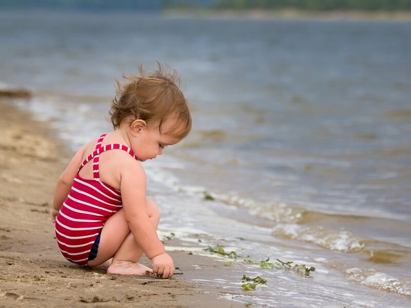 Toddler in Striped Swimsuit