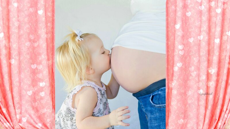 Toddler Kissing Pregnant Belly