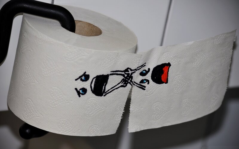 toilet paper with drawing
