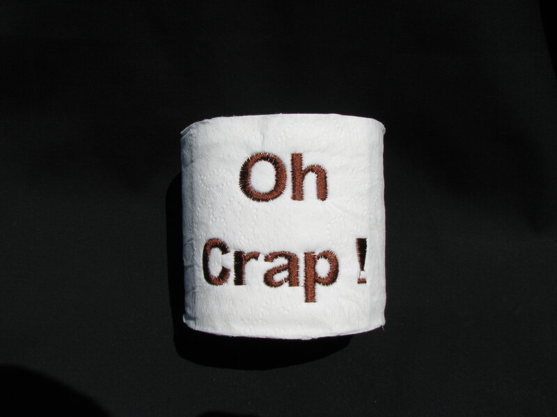 toilet paper with embroidered text
