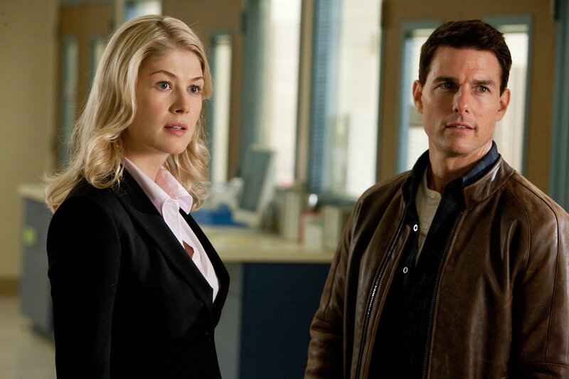Tom Cruise and a woman in an office