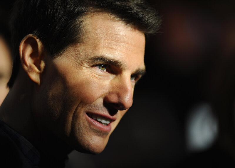 Tom Cruise smiling in profile