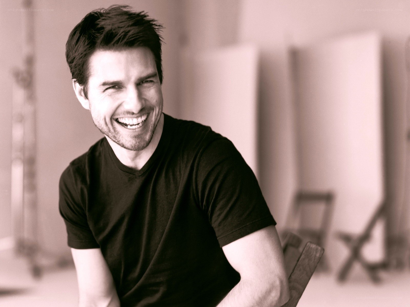 Tom Cruise smiling in studio