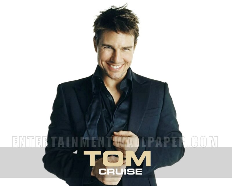 Tom Cruise smiling in suit