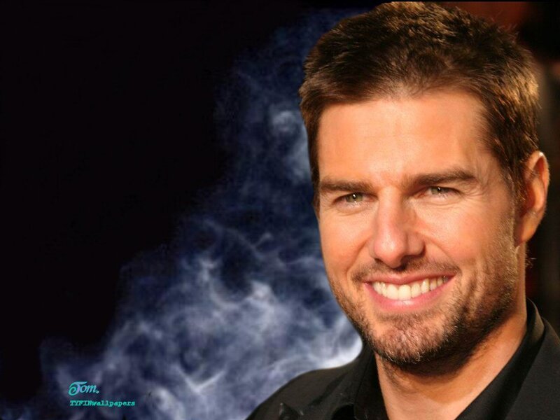 Tom Cruise smiling with smoke