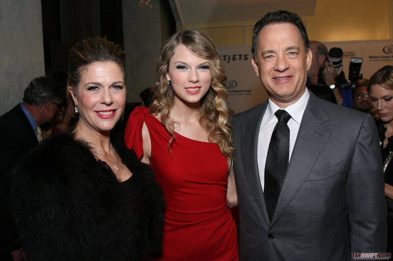 Tom Hanks and Taylor Swift with a woman