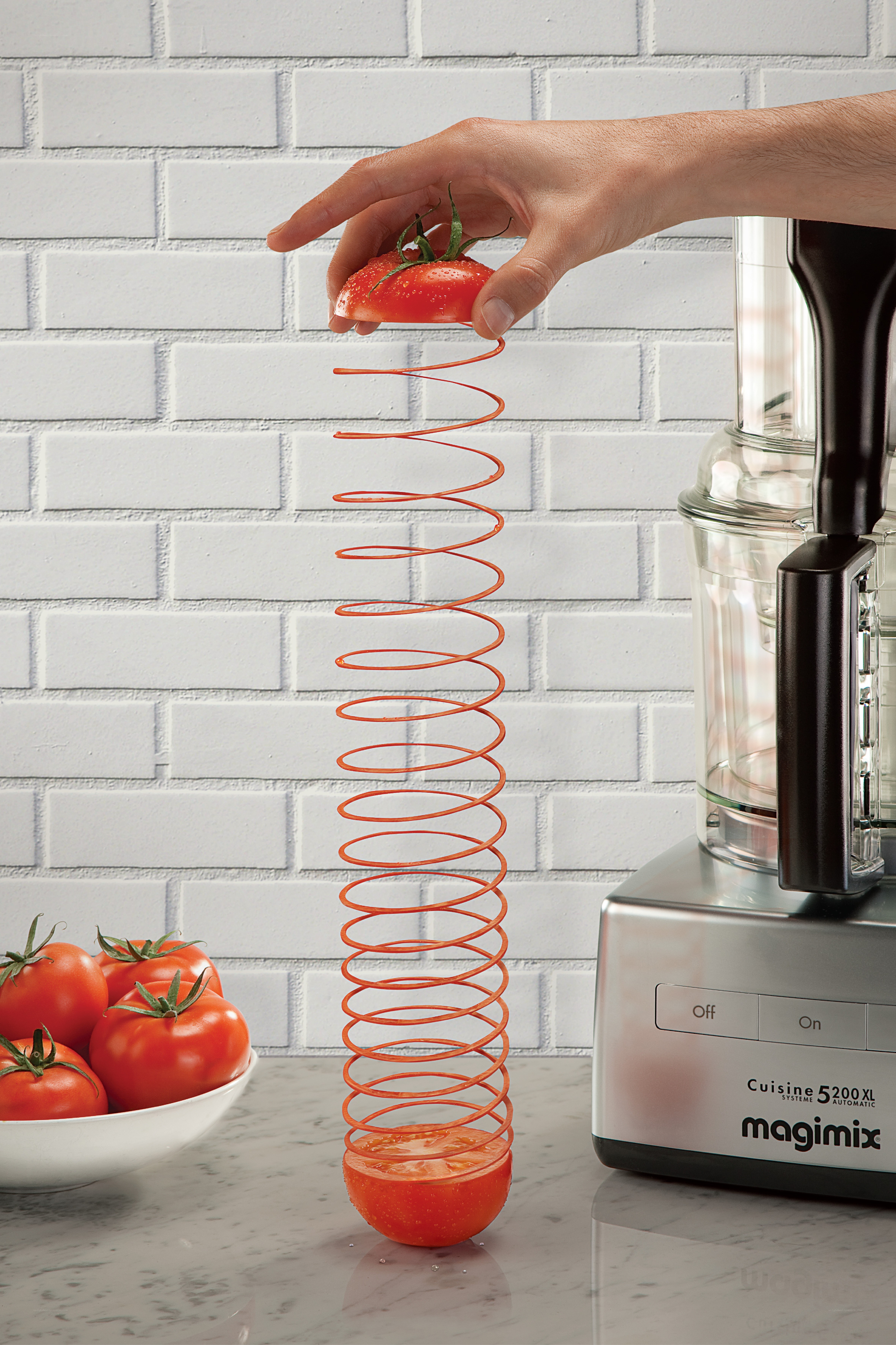 Tomato spiral slicer in action