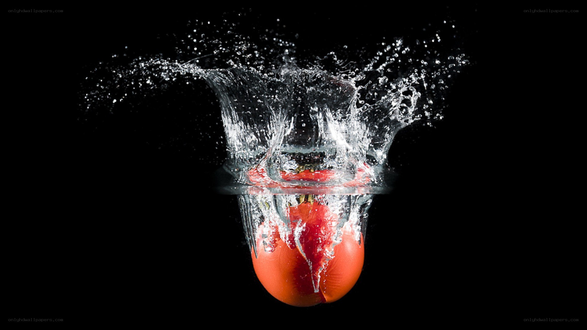 tomato splashing in water