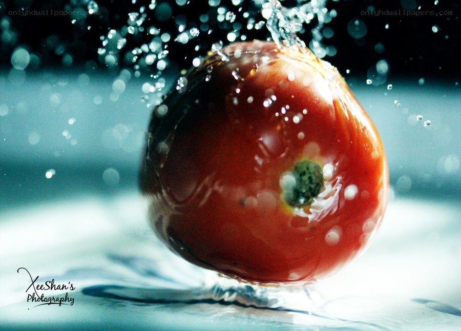 Tomato splashing in water