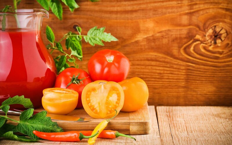 Tomatoes and Peppers on Wood