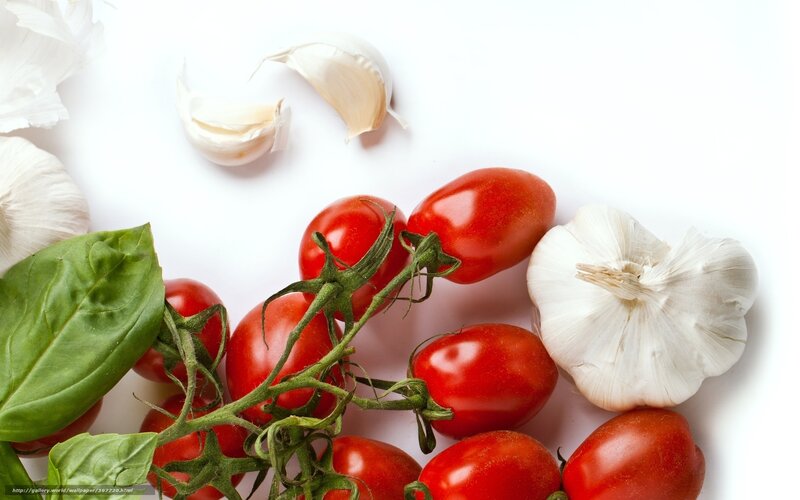 tomatoes garlic basil on white