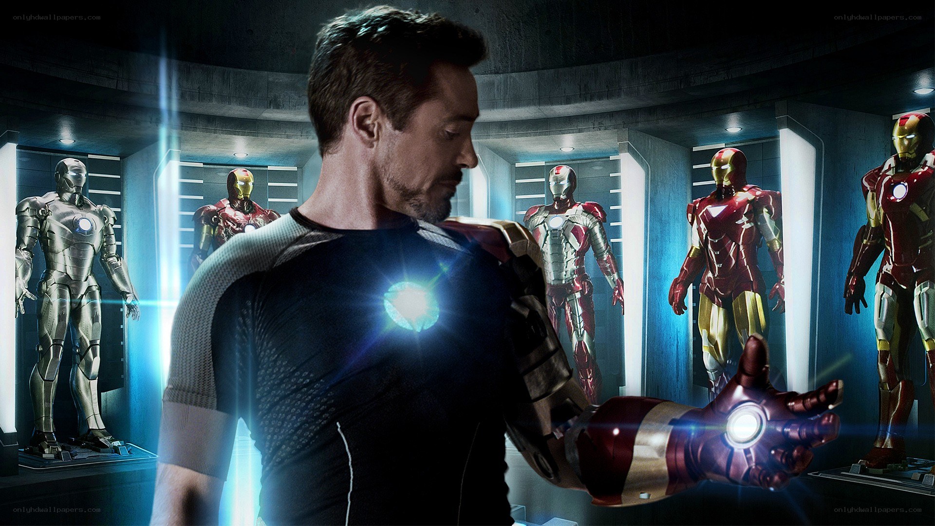 Tony Stark with Iron Man suits