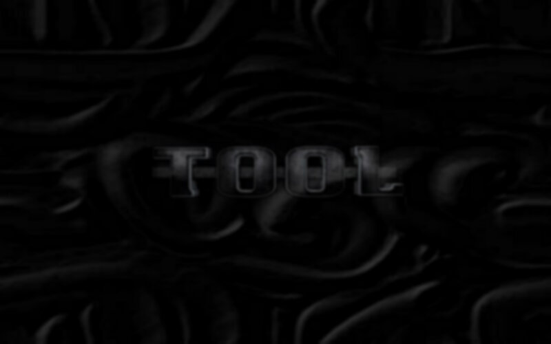 Tool band logo on dark background