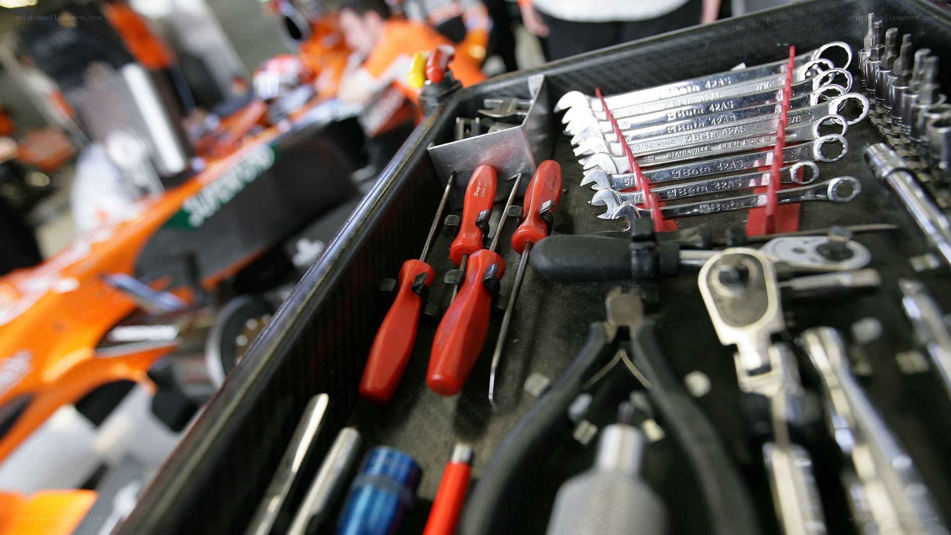 Toolbox with racing car in background