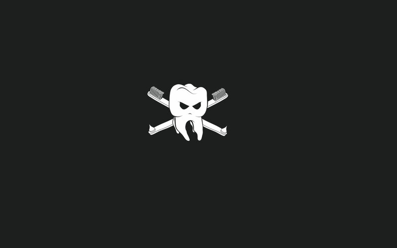 tooth and toothbrush logo