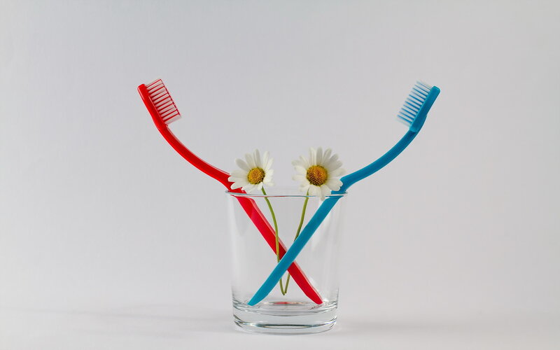 Toothbrushes in Glass