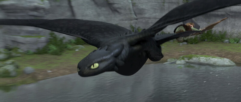 Toothless flying over water