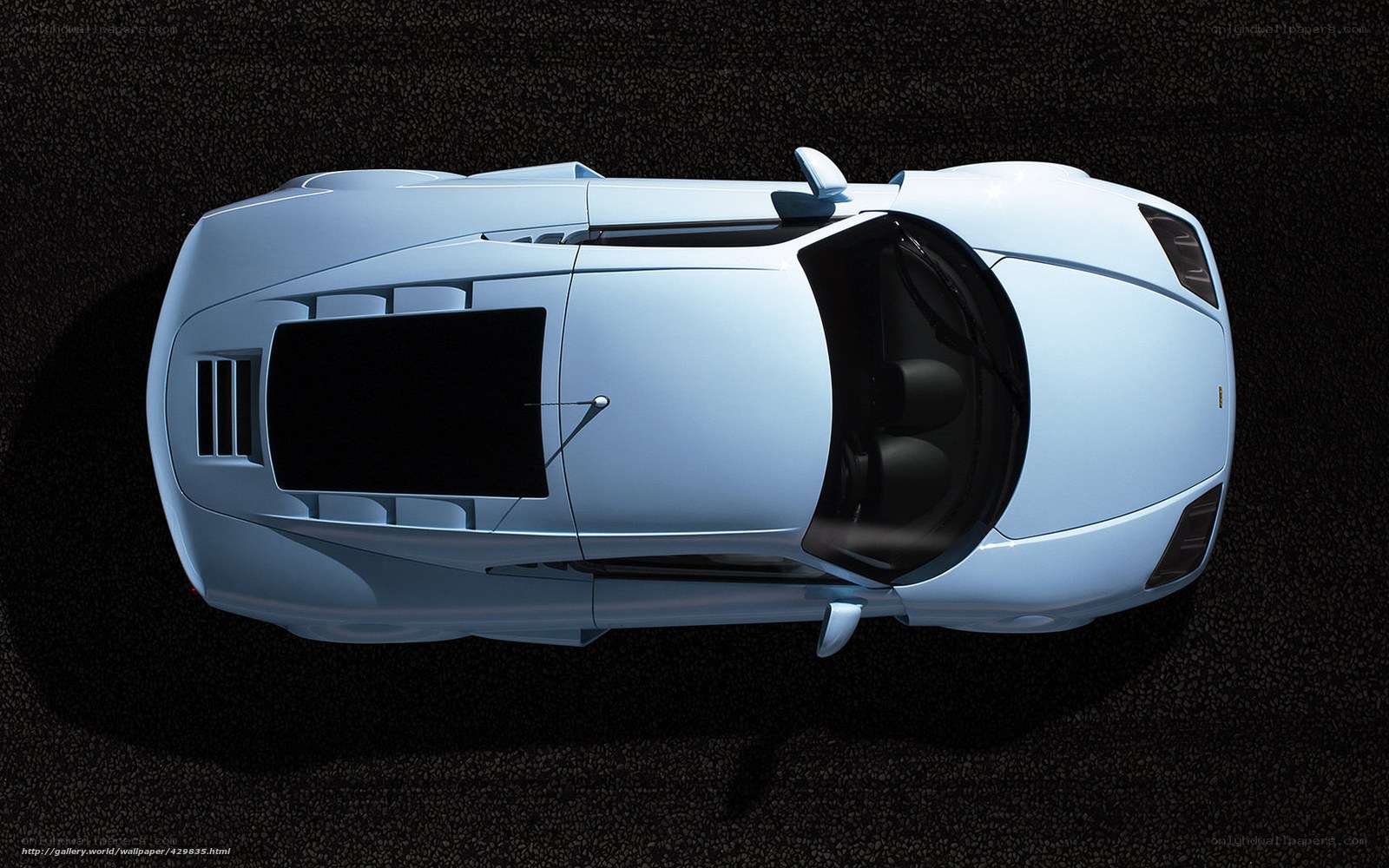 Top-down view of a light blue sports car
