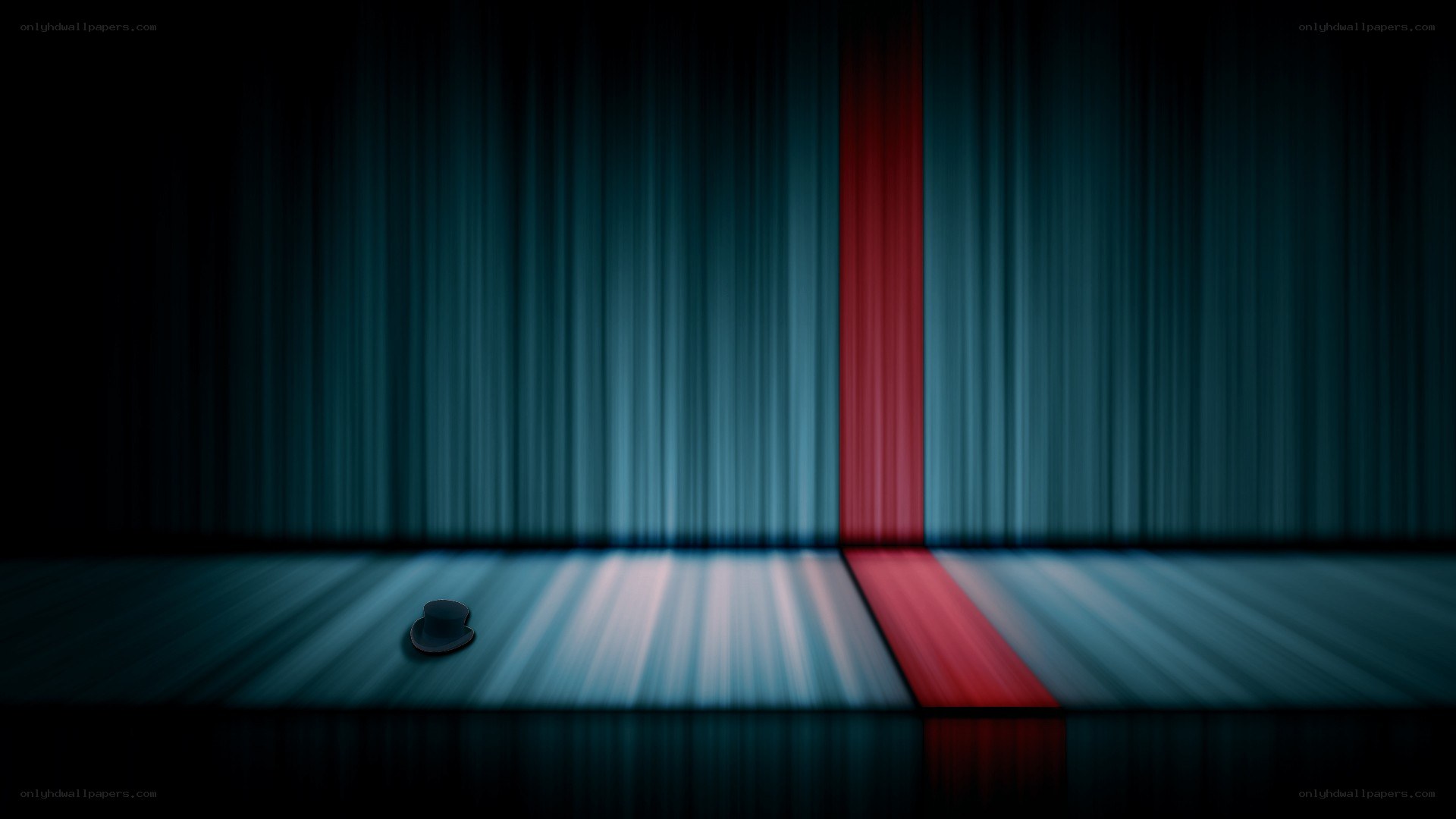Top hat on stage with red spotlight