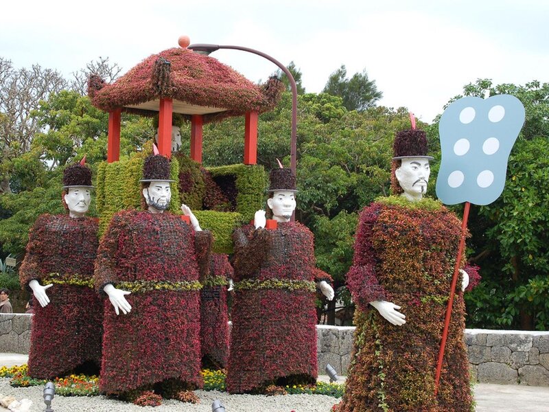 Topiary figures in garden