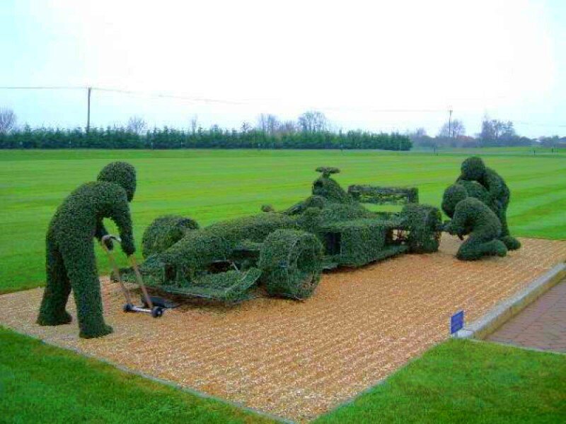 Topiary race car sculpture