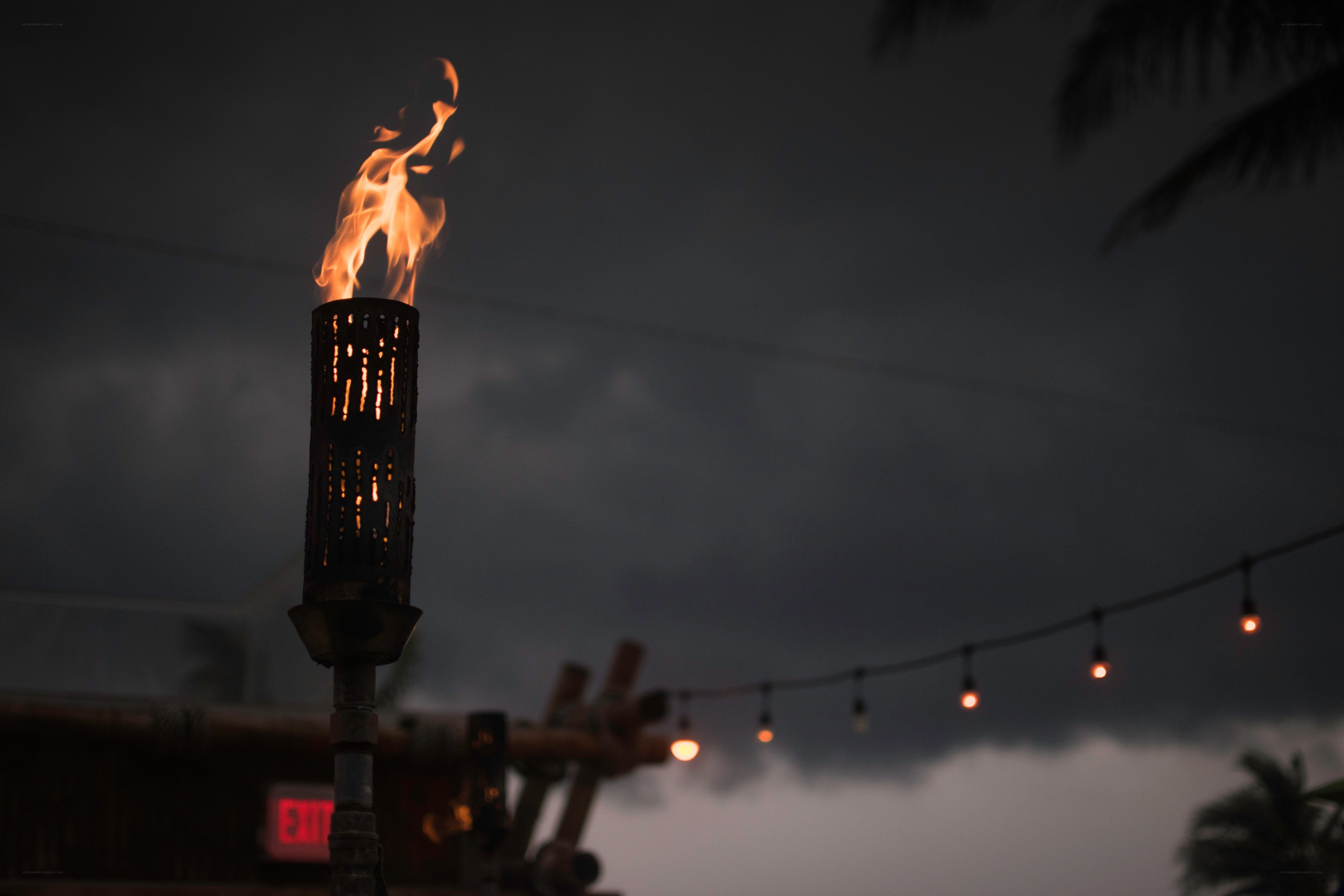 Torch burning at dusk