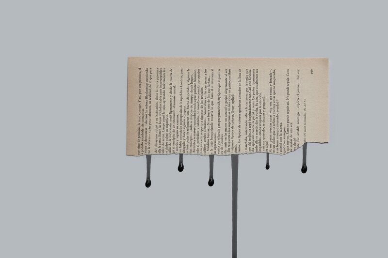 Torn Book Page with Ink Drops