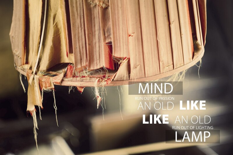 torn lampshade with text