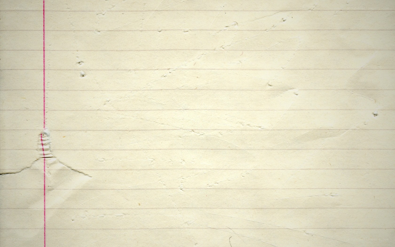 torn lined notebook paper