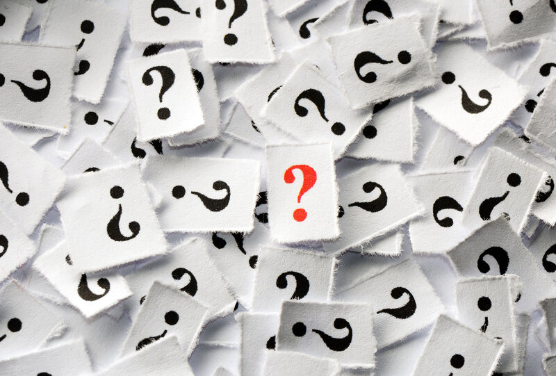 Torn Paper with Question Marks