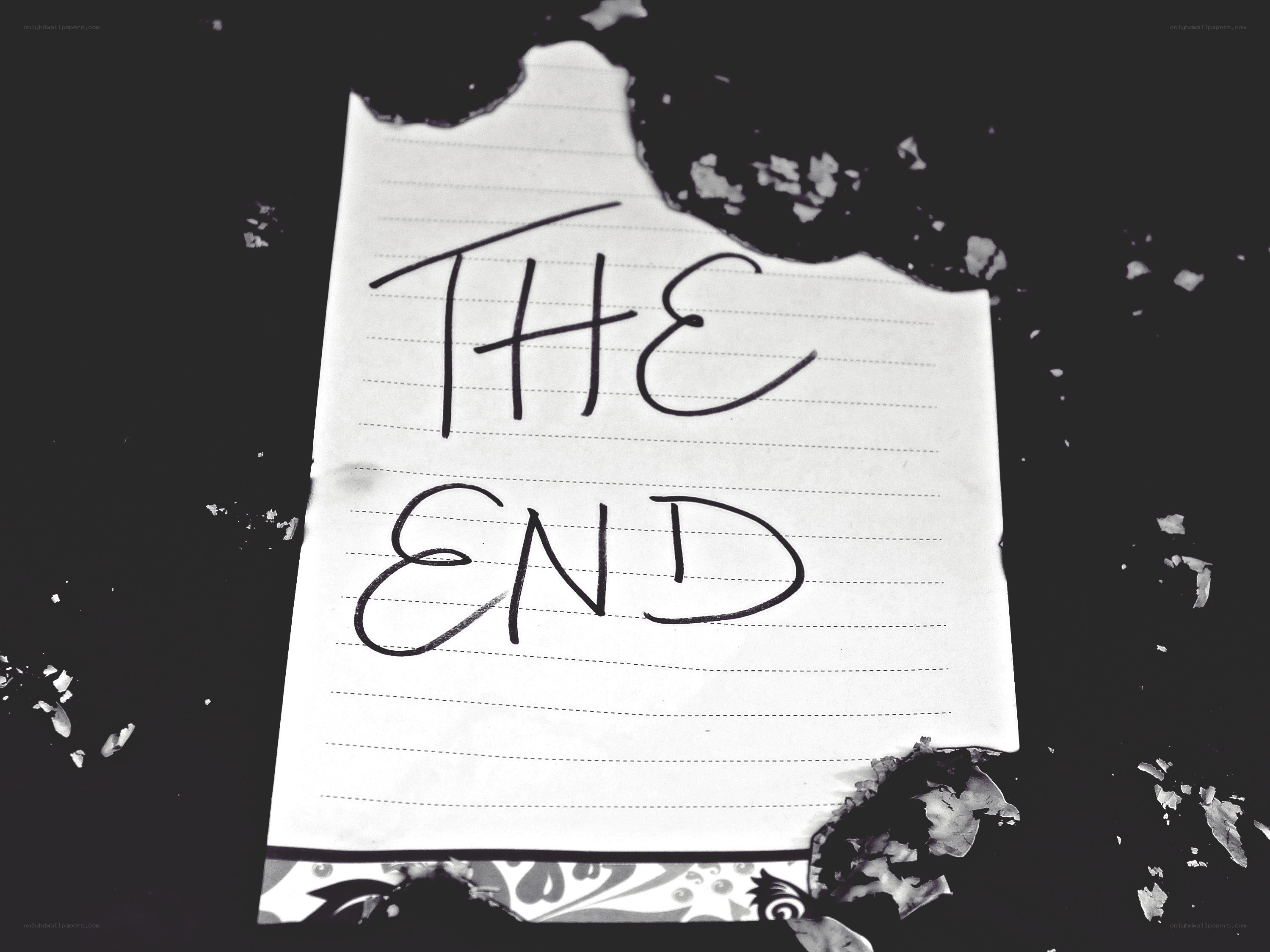 torn paper with 'the end'