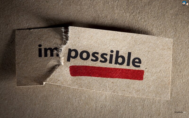 Torn paper with word impossible