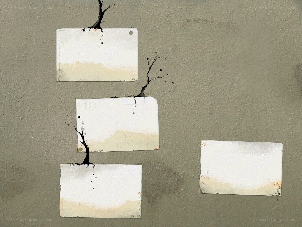 torn papers on a wall