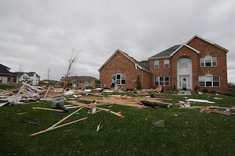 Tornado-damaged suburban home