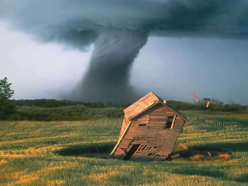 Tornado destroys house in field