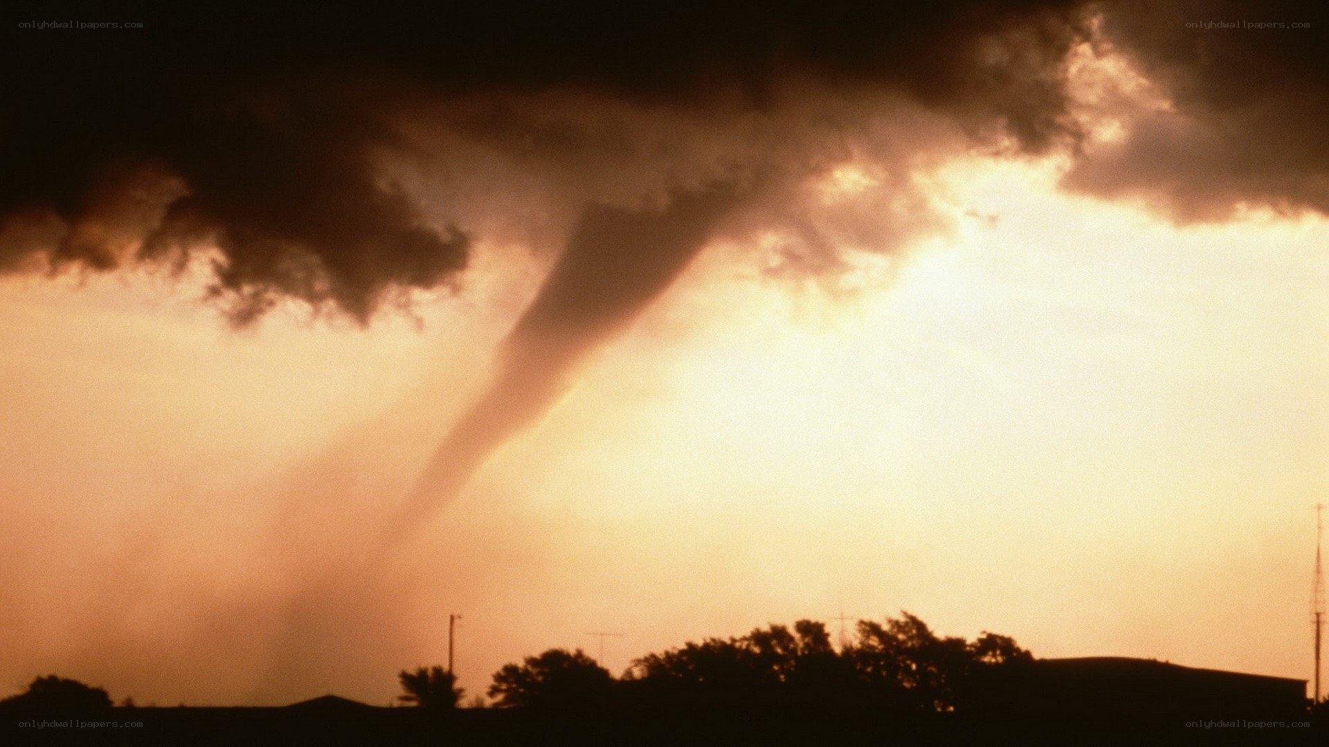 Tornado forming at sunset