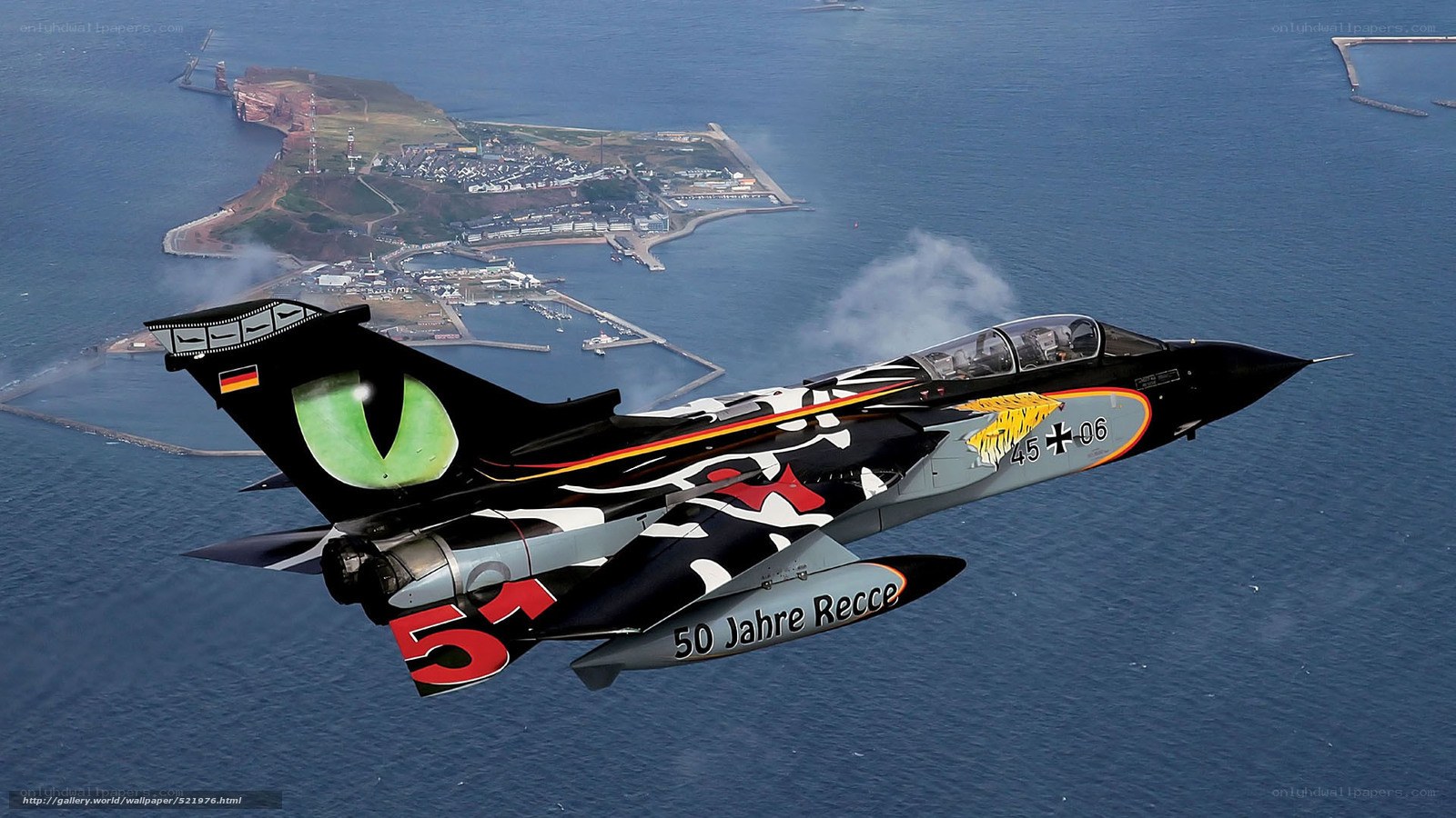 Tornado jet over coastal town