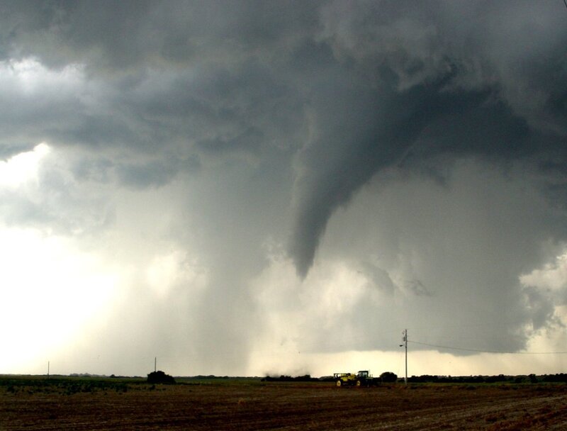 Tornado over a rural field