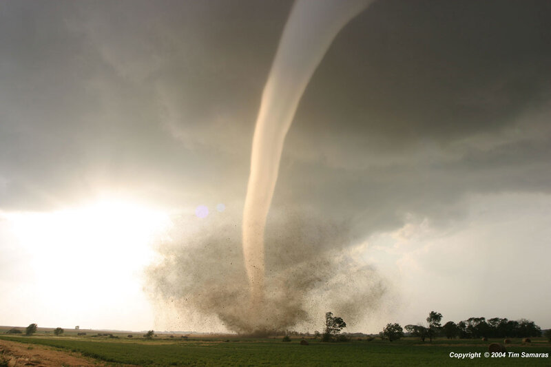Tornado over a rural field