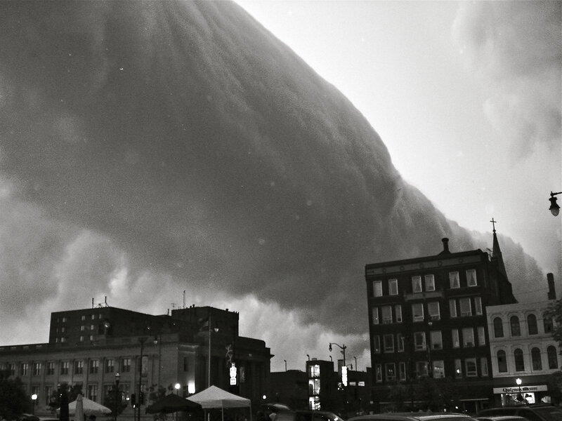 Tornado over city buildings