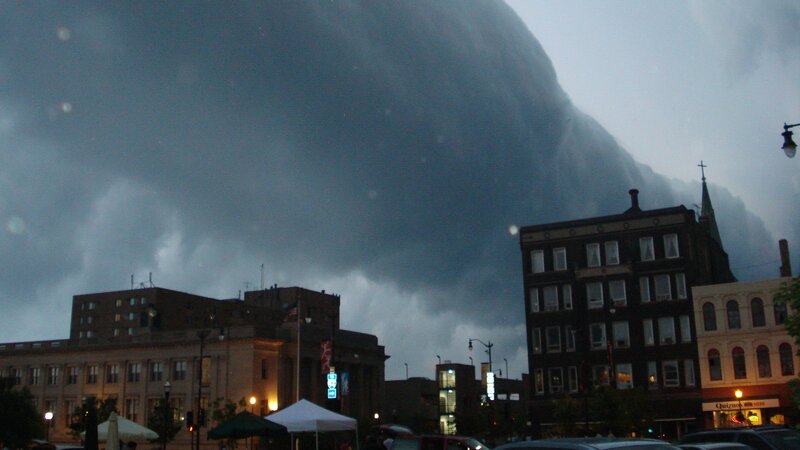 Tornado over city skyline