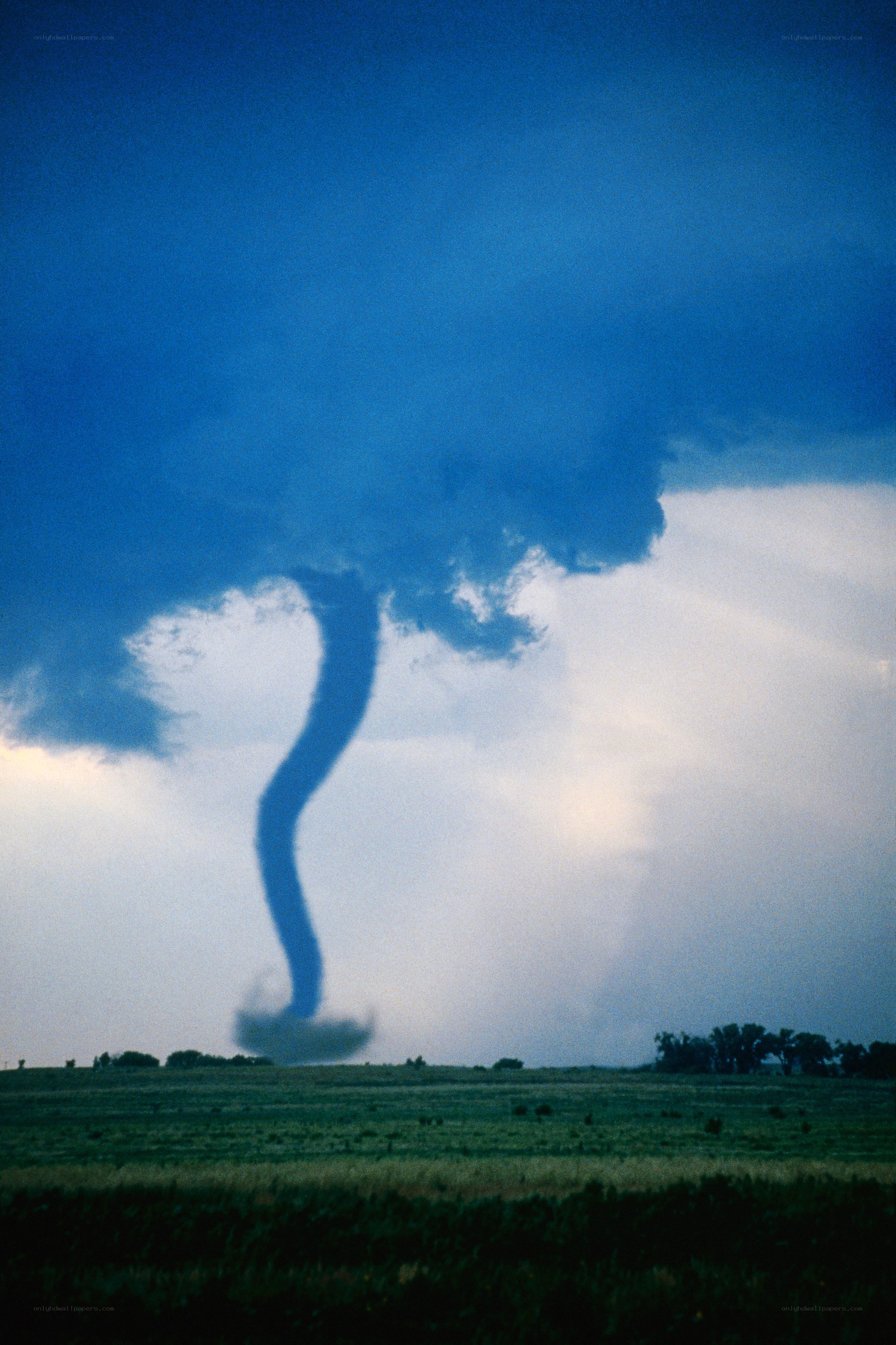 Tornado over open field