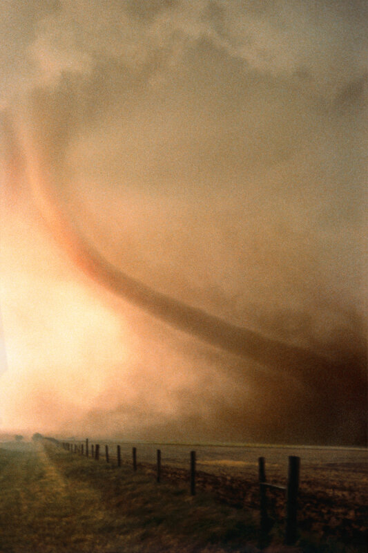 Tornado over rural field