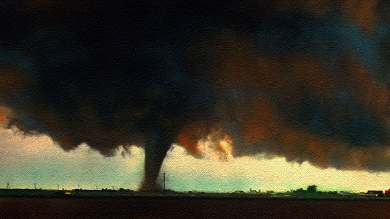 Tornado over rural landscape