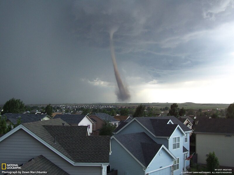 Tornado over suburban neighborhood