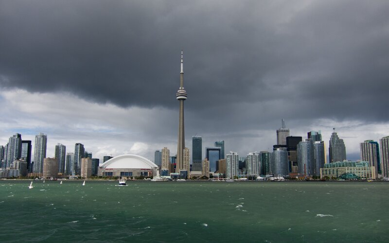 Toronto skyline under storm clouds