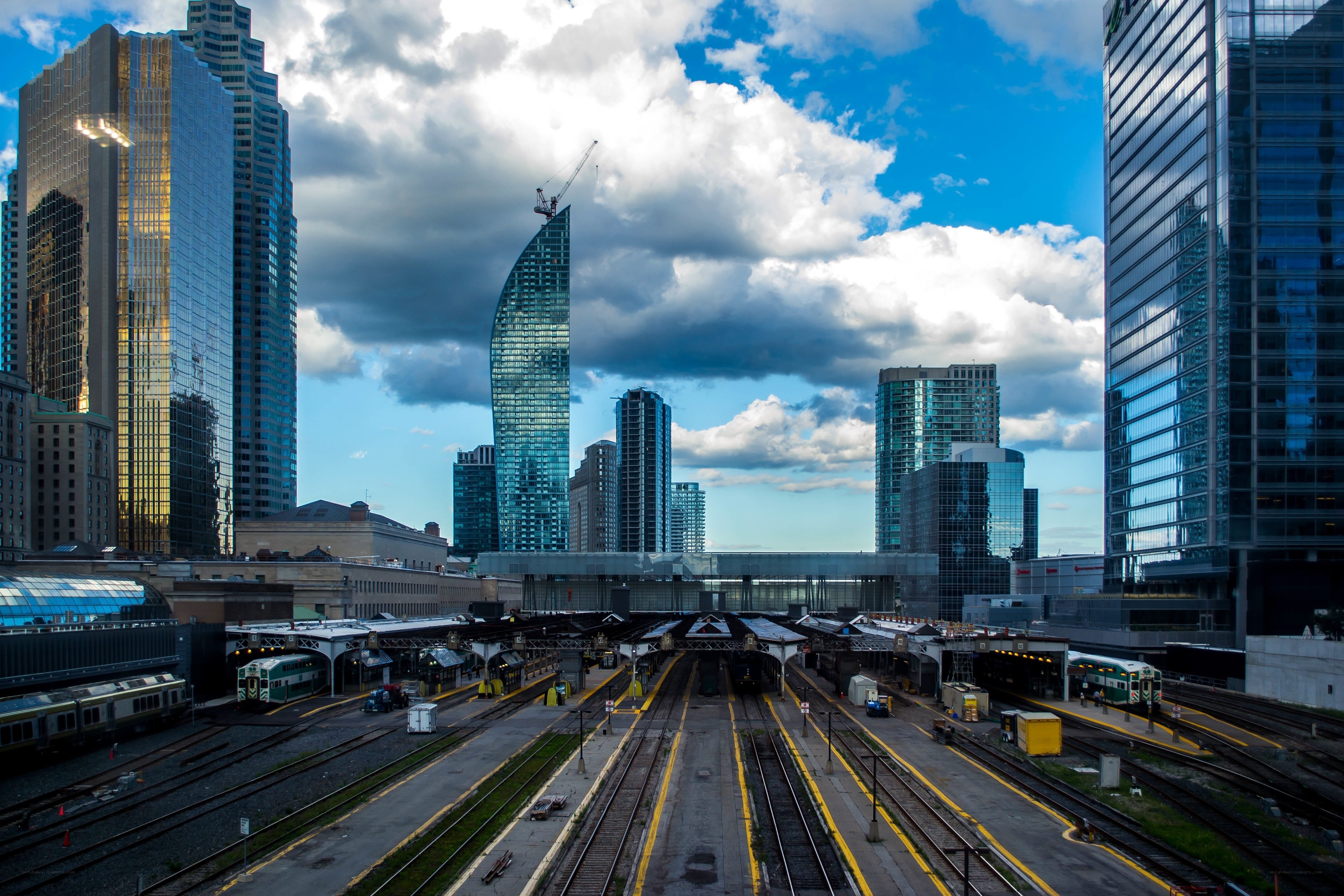 Toronto train station with skyscrapers